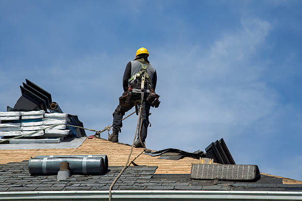 Professional Storm Damage Roof Repair technician working in Wilton, CT